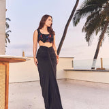 Kusha Kapila in the Noir draped skirt